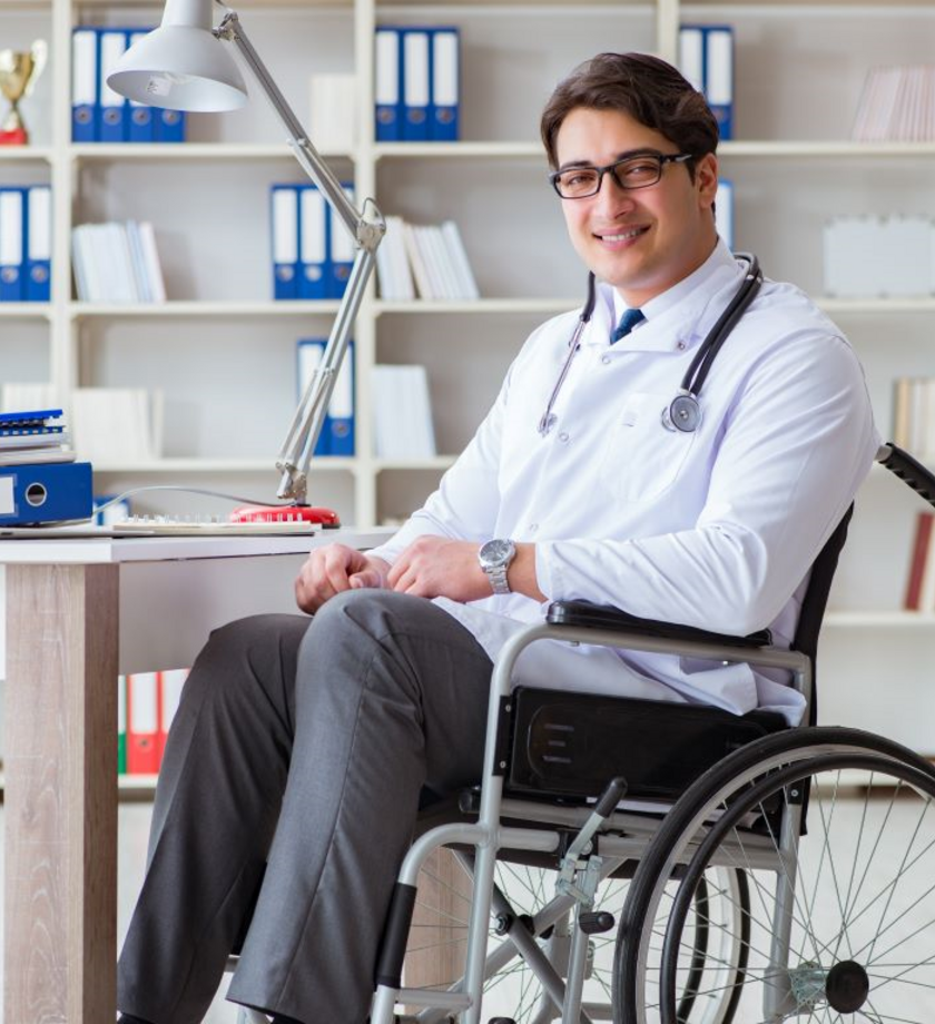 Physician using a wheelchair in a laboratory