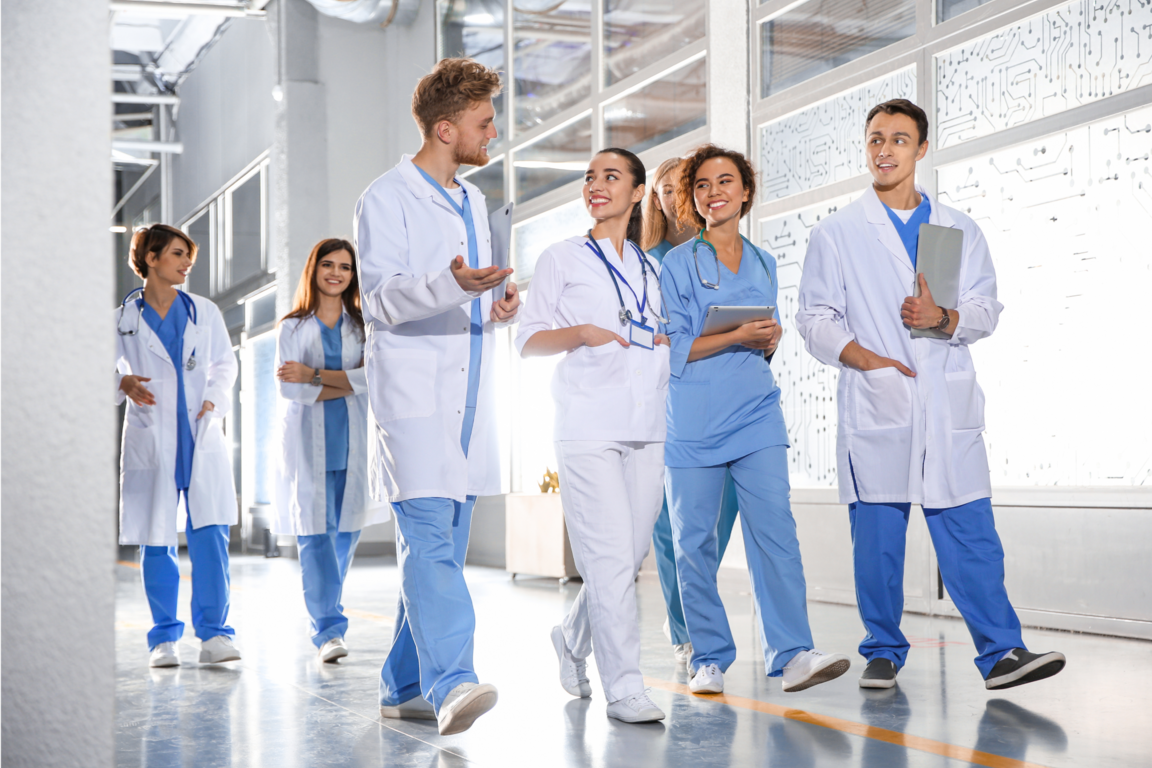 doctors conversing while walking