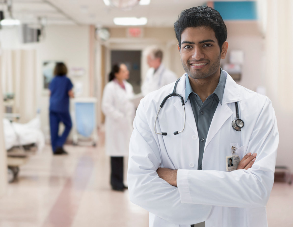 Medical professional stands in hospital